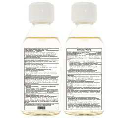 Cold flu syrup bottle with detailed drug facts and dosage information, mint flavor, multi-action formula with ibuprofen and acetaminophen for cough and congestion relief