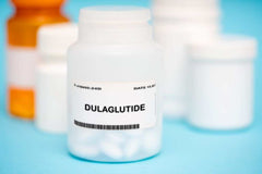 White label oral GLP-1 peptides bottle labeled Dulaglutide with capsules inside