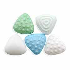 NRT smoking cessation lozenges in various colors and textures designed to support quitting smoking with added vitamins and antioxidants