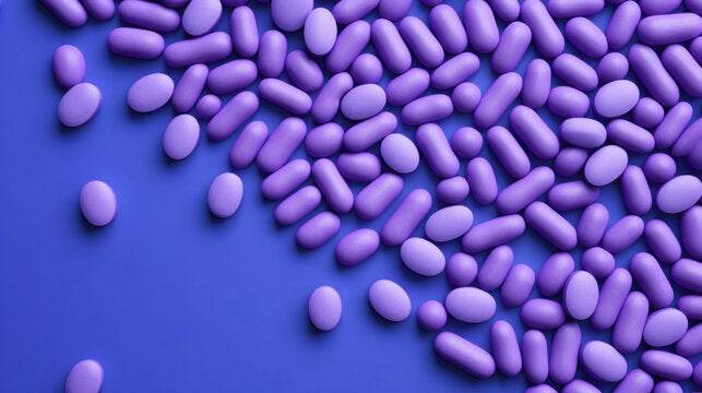 Purple caplet pills representing Naproxen Sodium or Ibuprofen combined with Omeprazole for anti-inflammatory and stomach protection